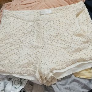 Cream lace shorts.